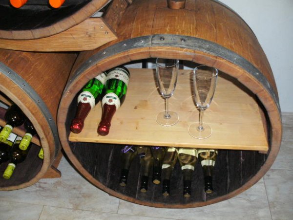 Bacchus-M Weinregal für bis zu 50Fl. aus massivem Eichenholzfass