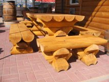 1m Sitzbank 24-1M-RBSB-RL-B aus massiven Rundbohlen mit 24cm Durchmesser mit 1m Länge - Rückenlehne aus geschwungenem Brett